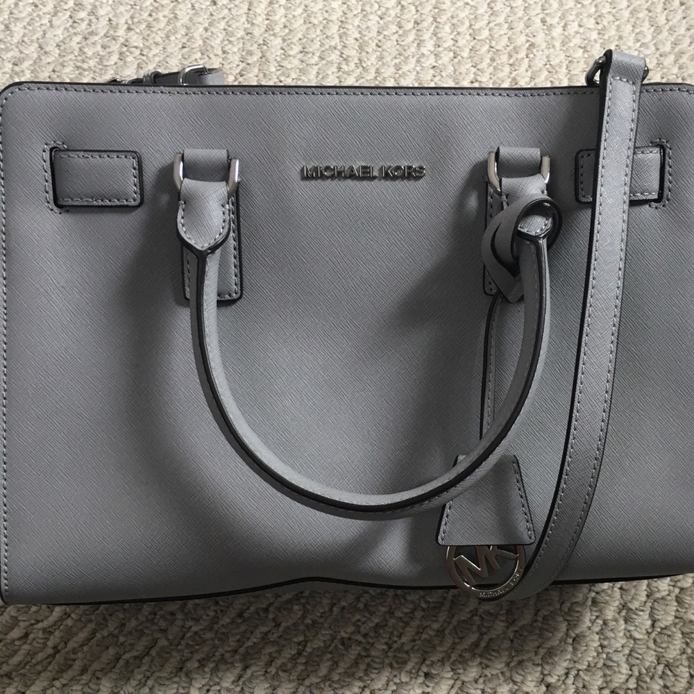 Michael Kors Sling Handbag in Grey.